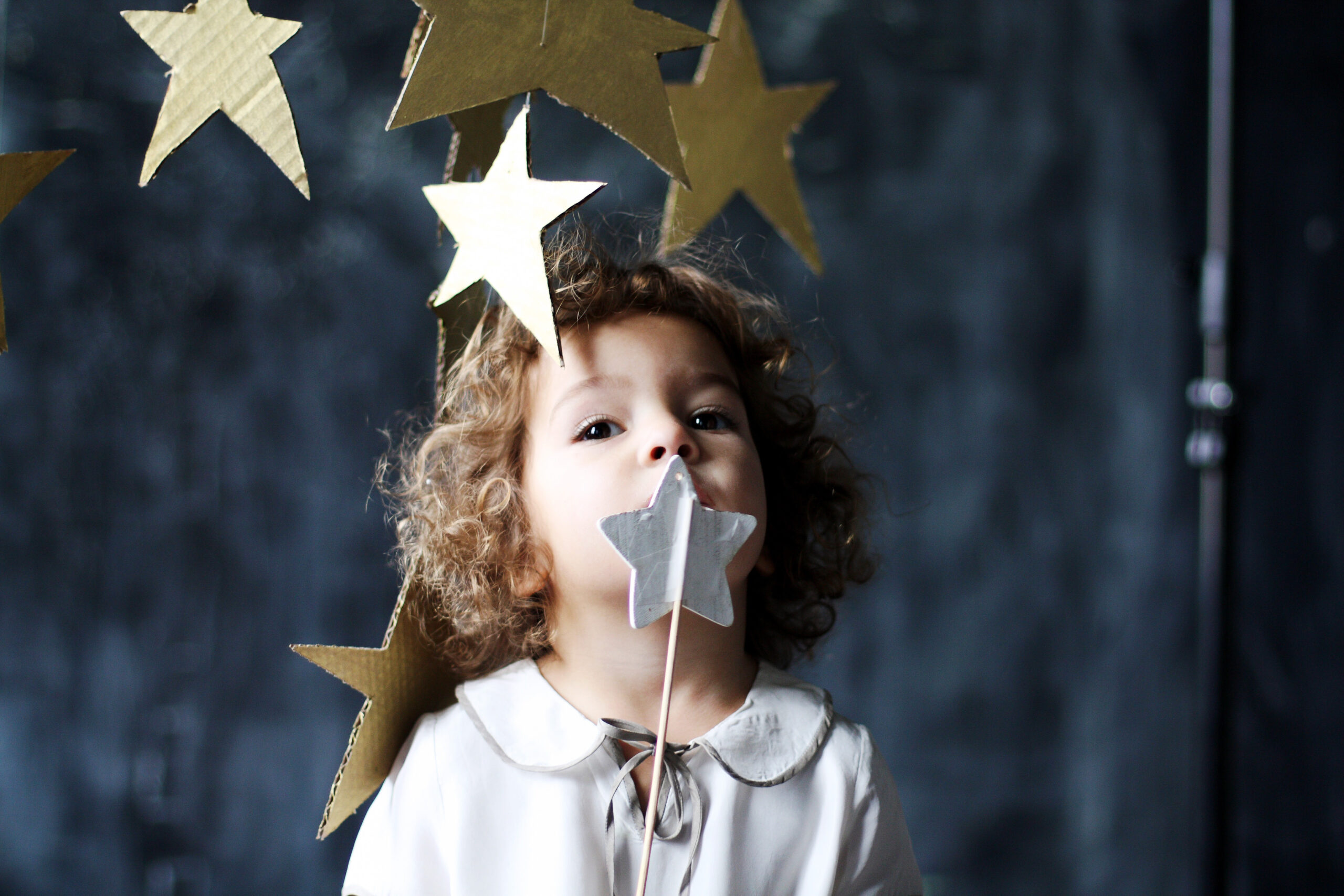 studio-portrait-of-cute-curly-parisian-girl-with-h-2023-11-27-05-20-47-utc